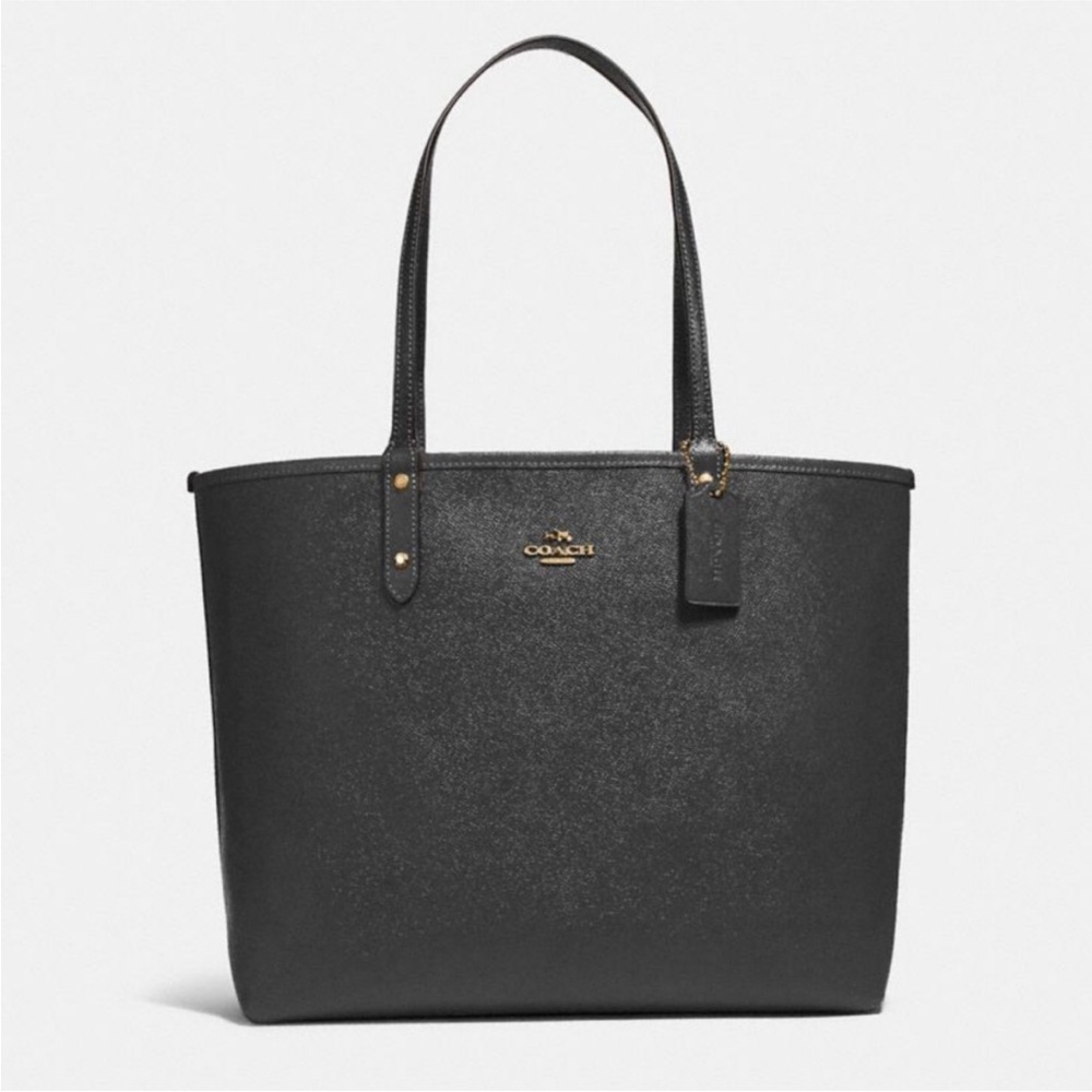 Coach Signature Coated Canvas and Leather Reversible
City Tote